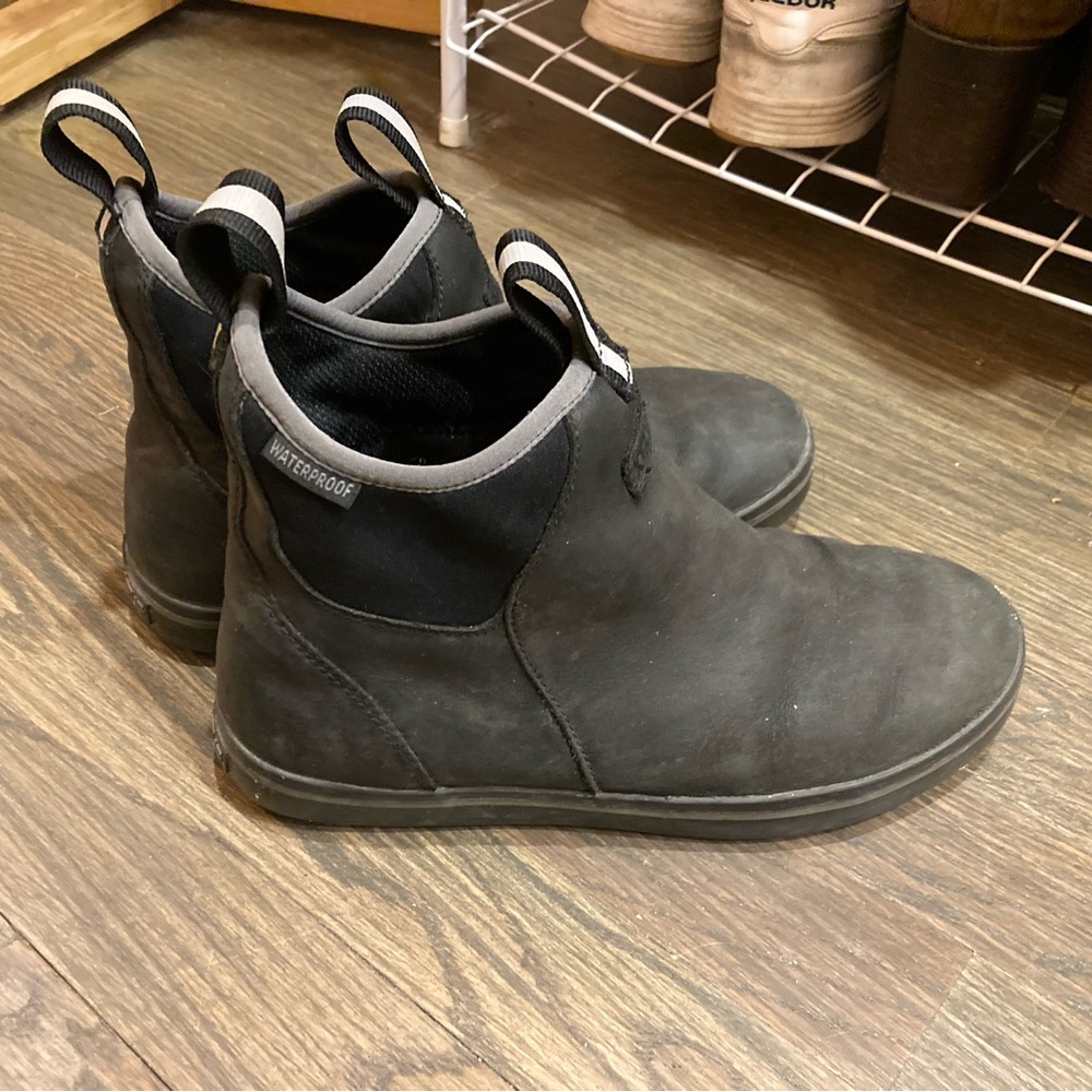 Black leather Xtratuf ankle deck boots